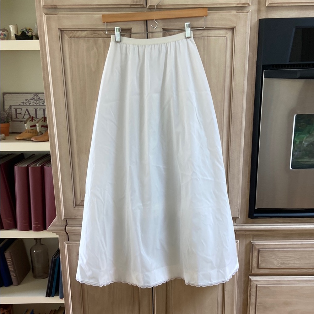 Vintage malco Modes sz 10 half slip zip back